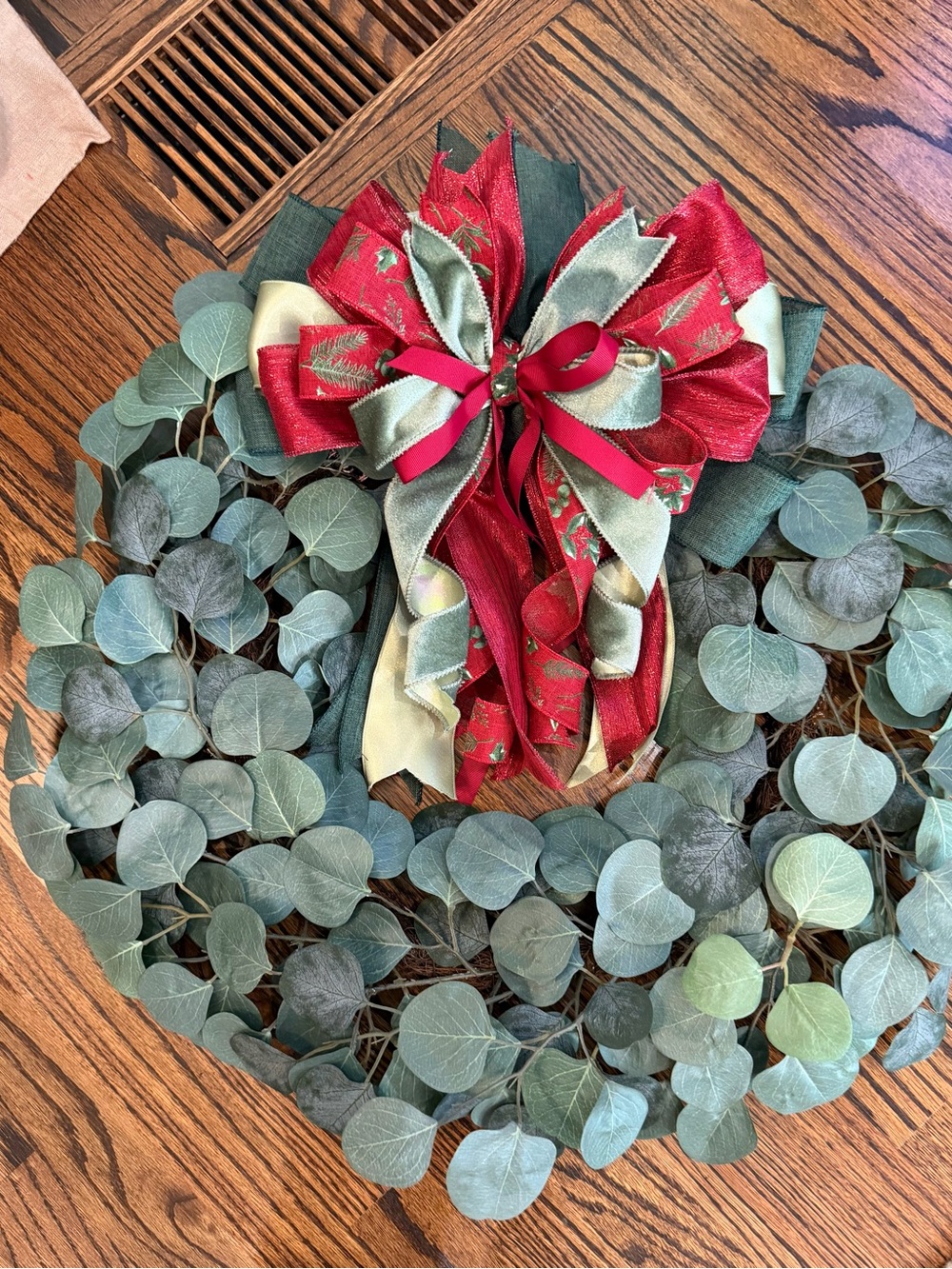 Eucalyptus Holiday Wreath with Red and Green Ribbon Bow